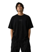 ArvoCulture Siyah oversize pamuklu tişört, göğsünde minimalist 'CHAOS' ve 'ARVOCULTURE' baskısı.